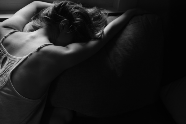 woman in pain uterus period cramps