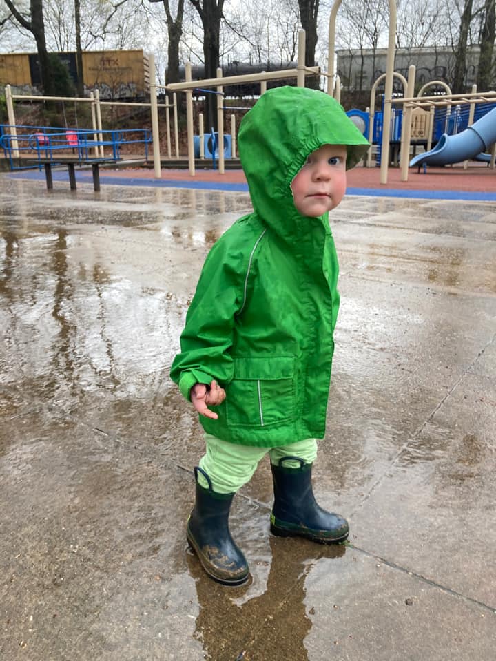 toddler in rain coat