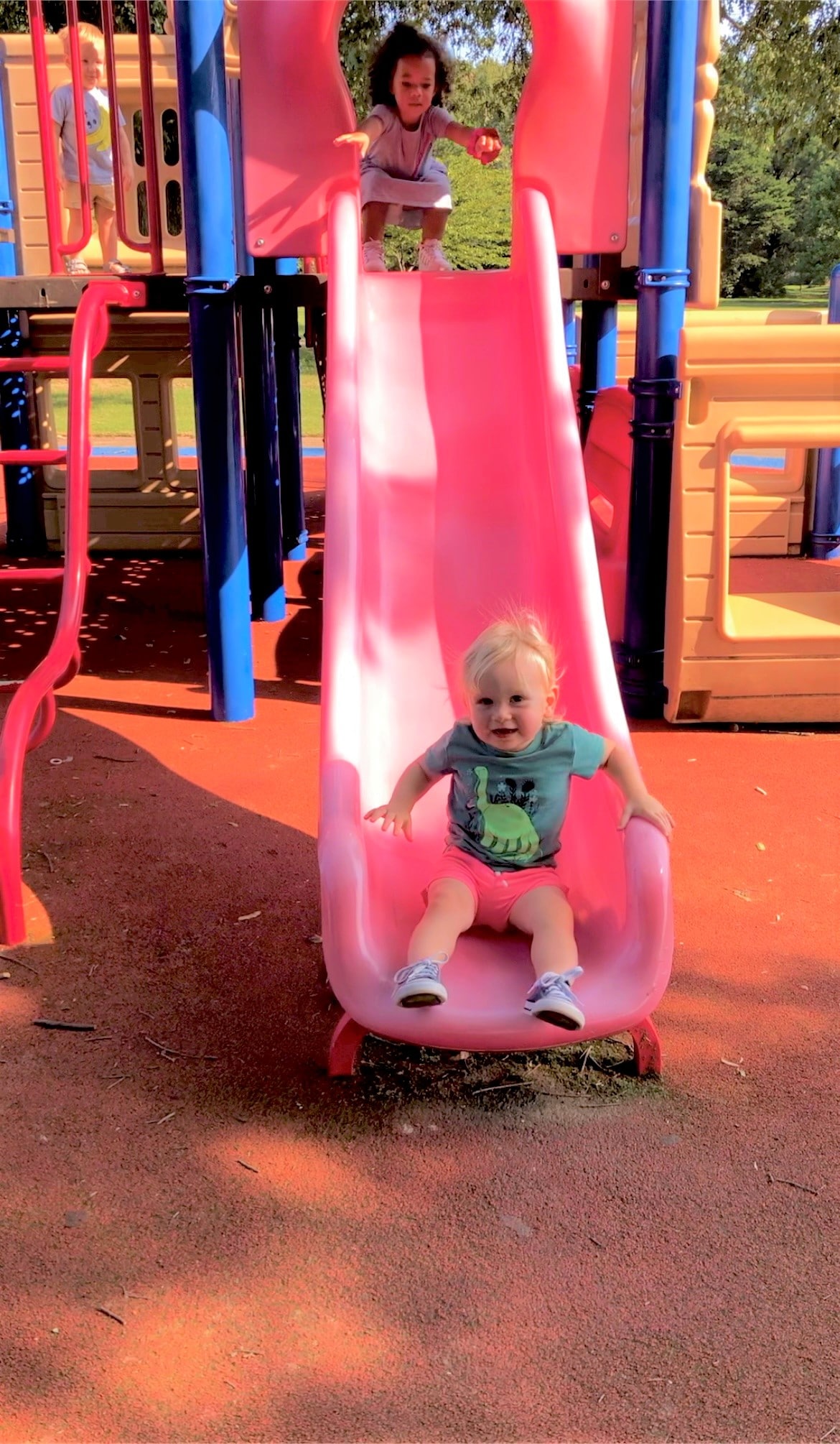 toddler on slide