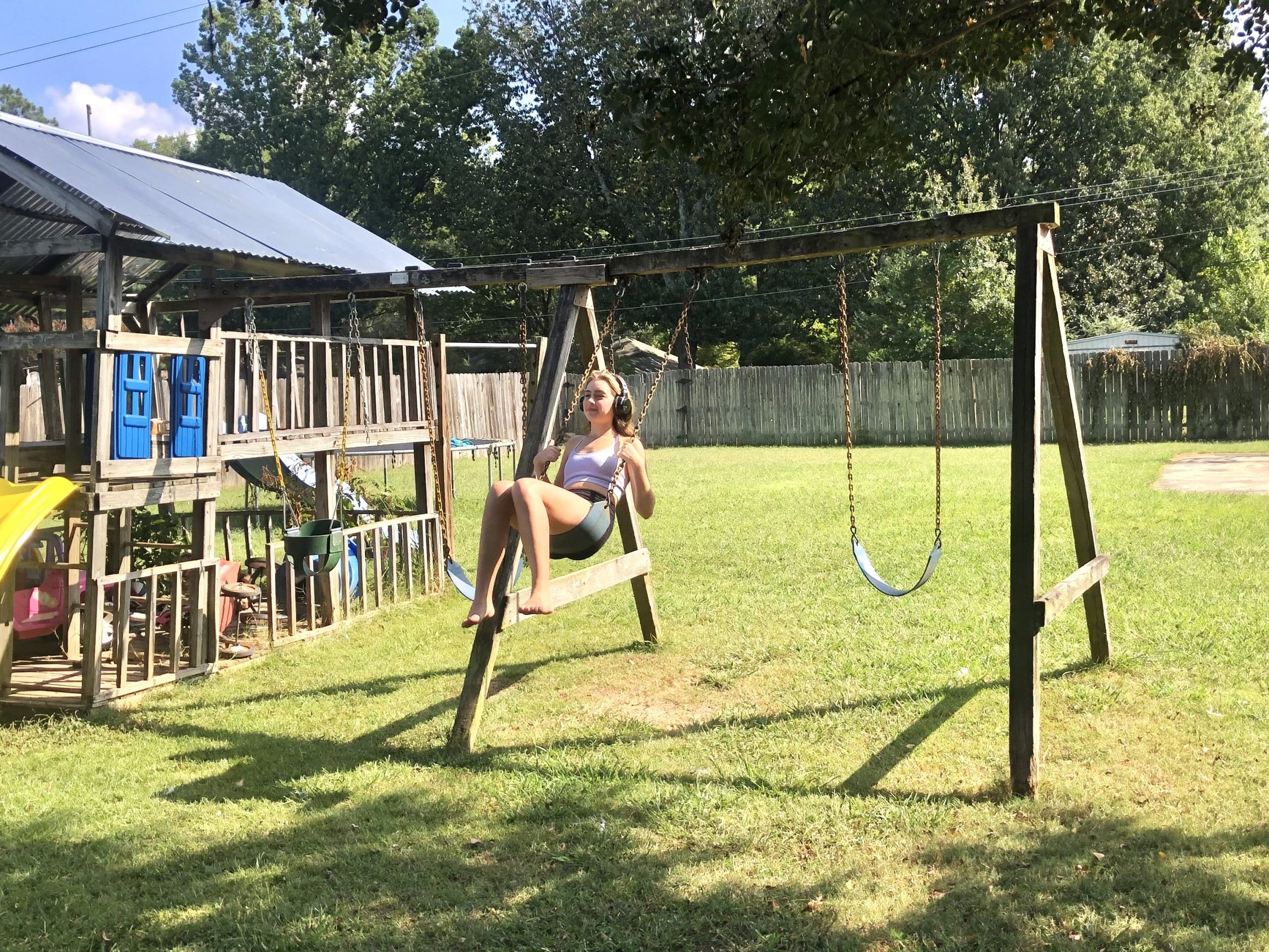 teenager swinging
