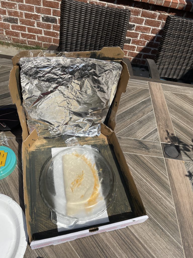 solar pizza oven cooking food