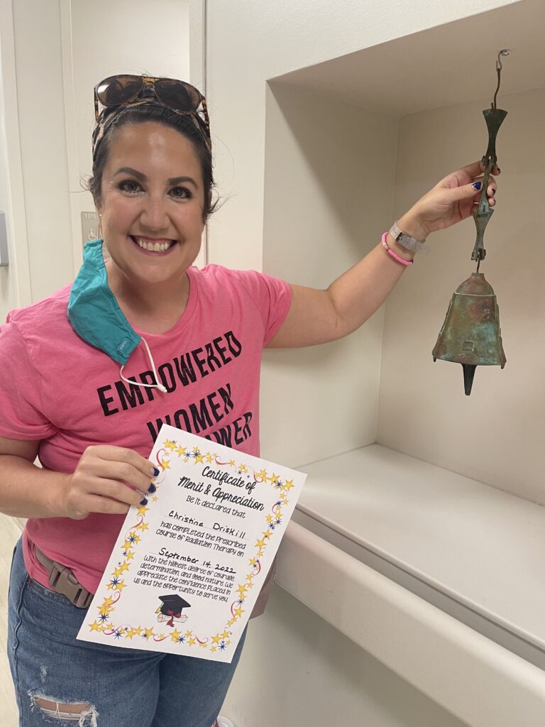 ringing the bell on the last day of chemo to treat breast cancer