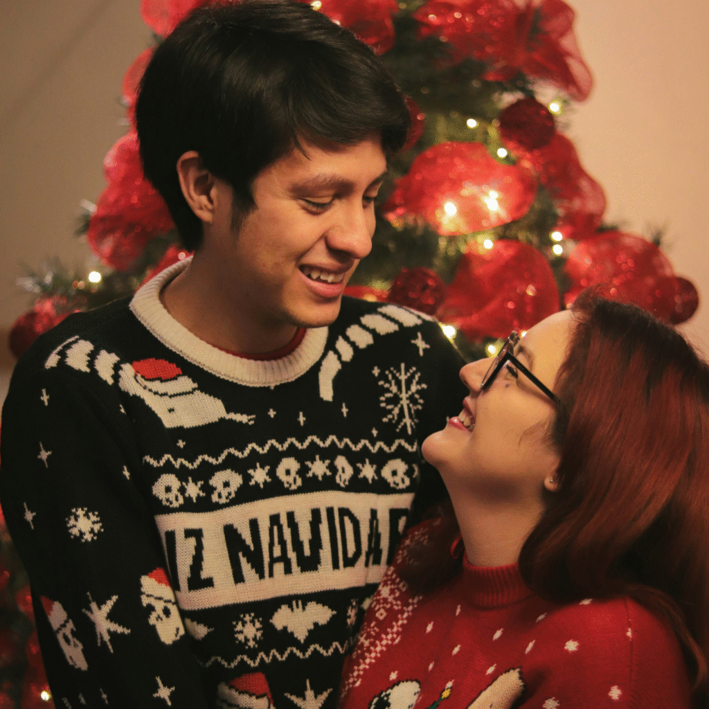 ugly Christmas sweaters on a couple