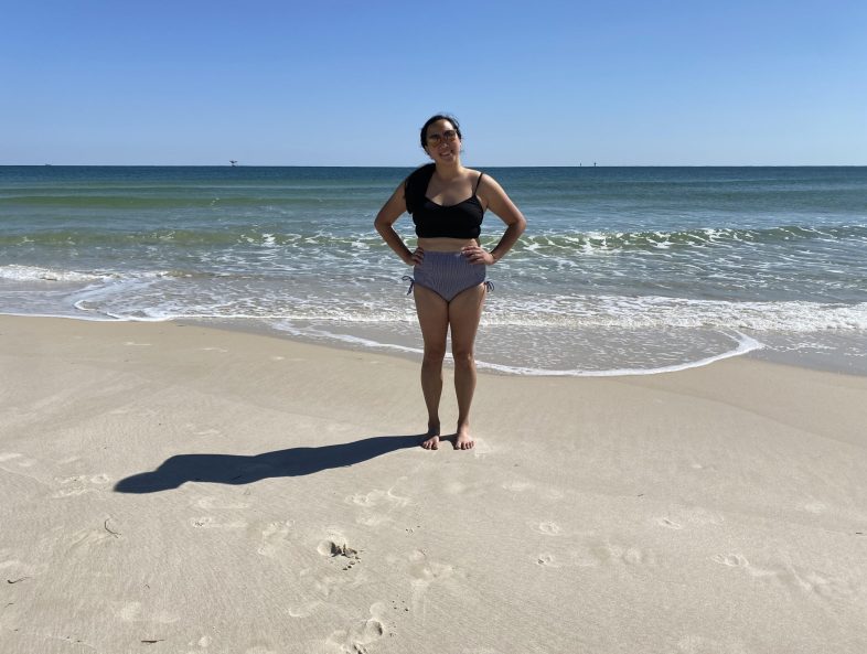 Author in her bathing suit at the beach
