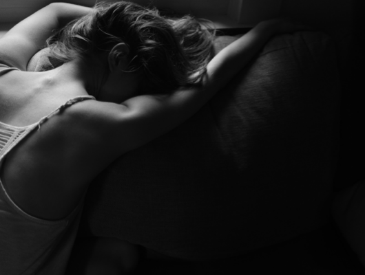 woman in pain uterus period cramps