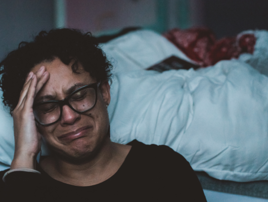 woman with depression crying breathe