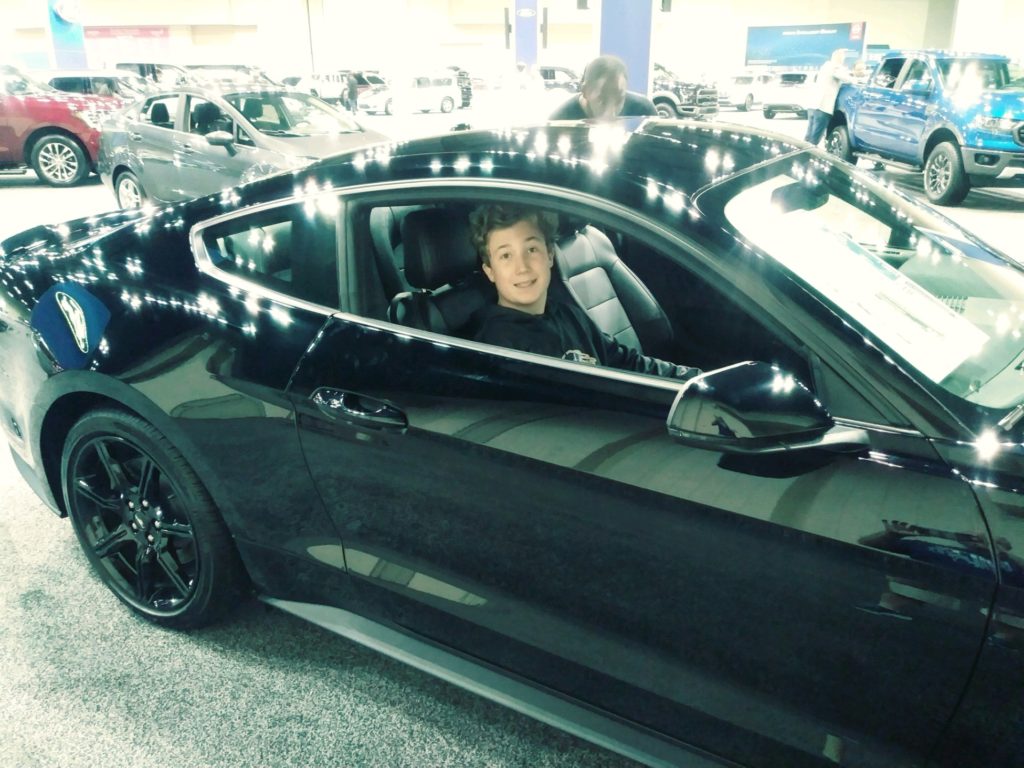 teenager in car
