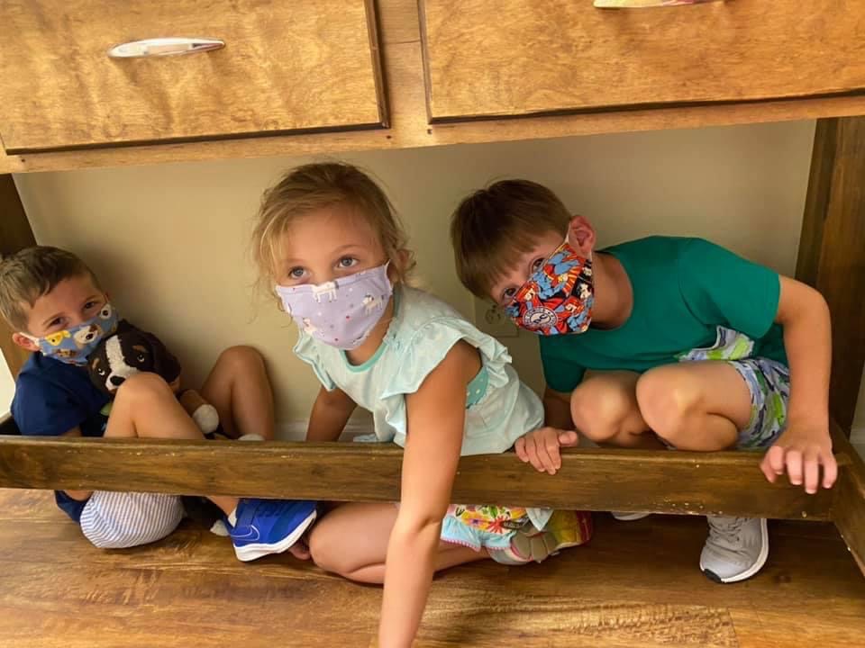 siblings in masks