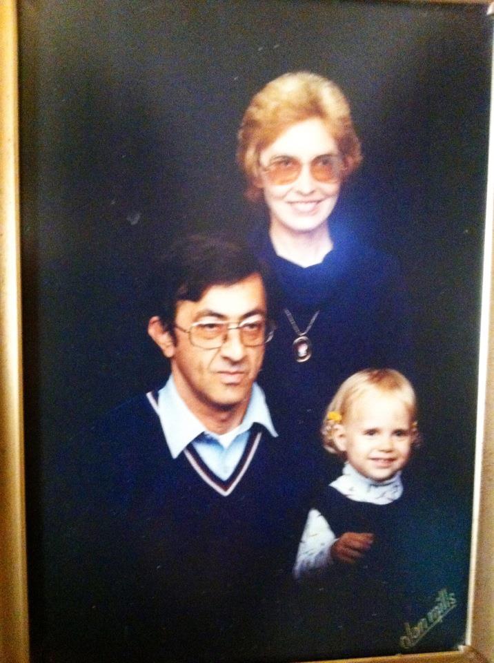 studio portrait of family of three