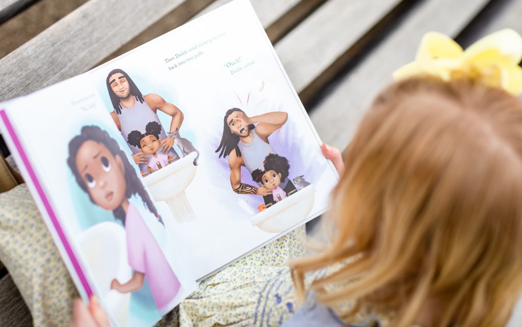 child reading Hair Love