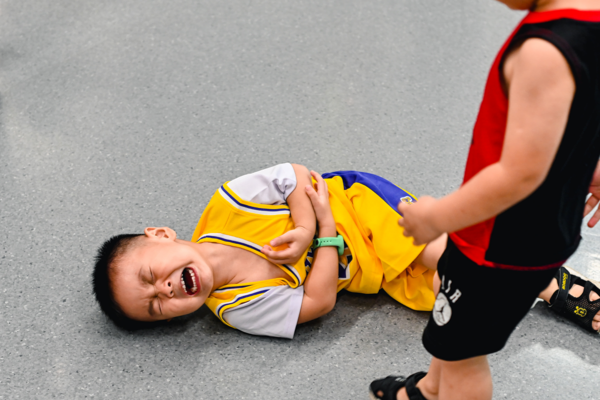 boy with autism having a tantrum