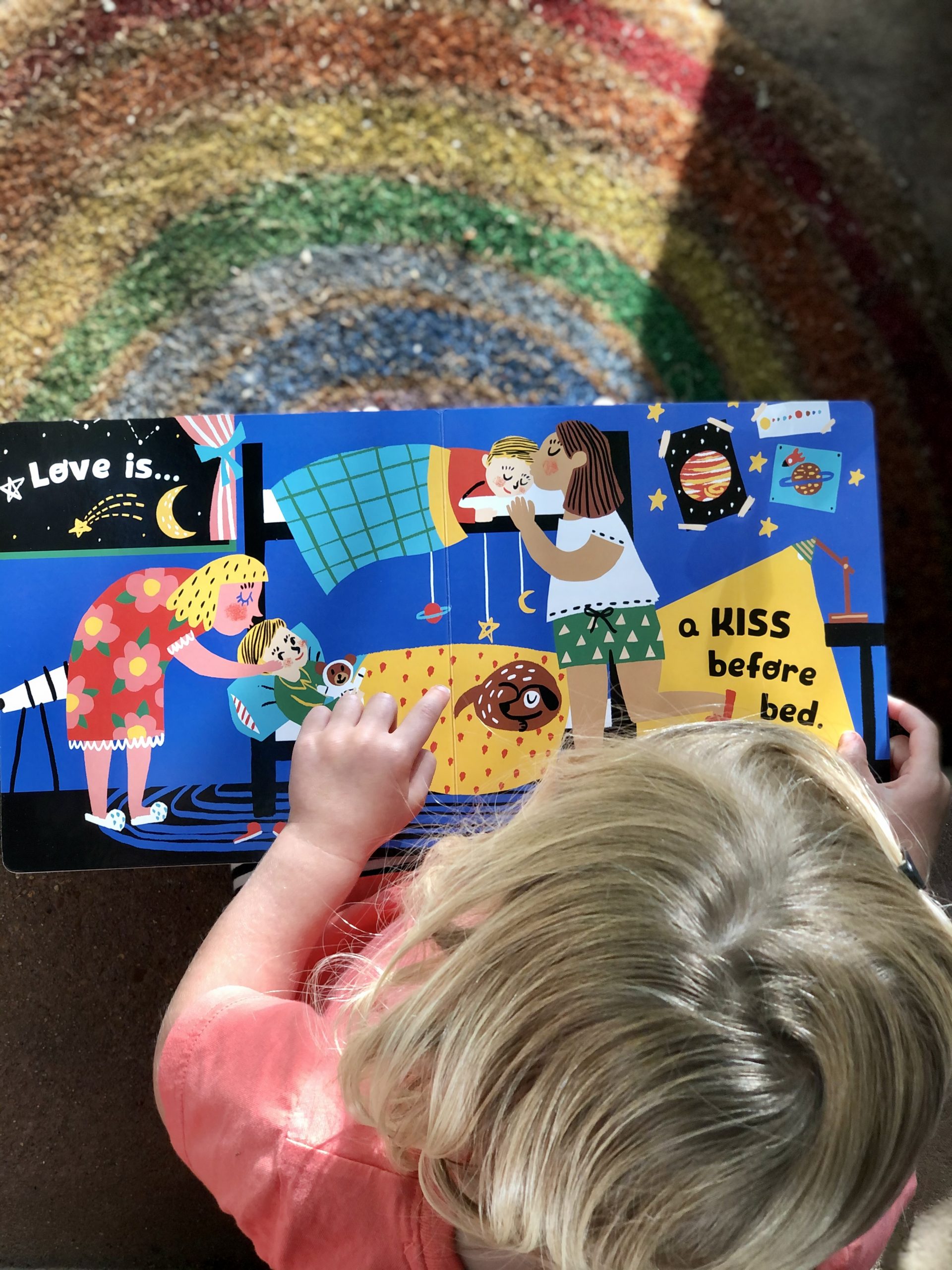 child reading Love Makes a Family 