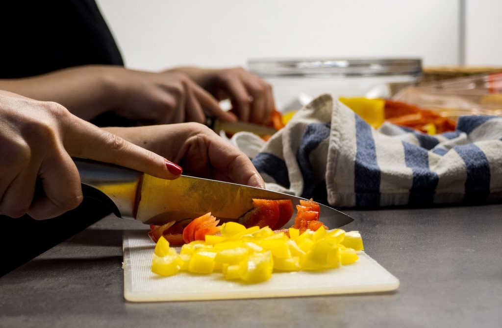 parenting sometimes involves cutting up vegetables and fruit