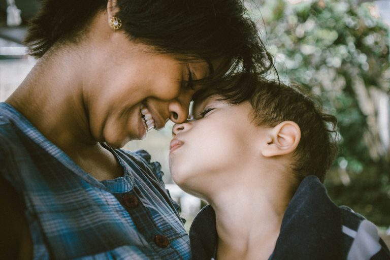 Picture of mom and son touching foreheads