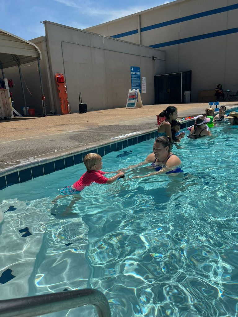 swimming at the pool in the summer