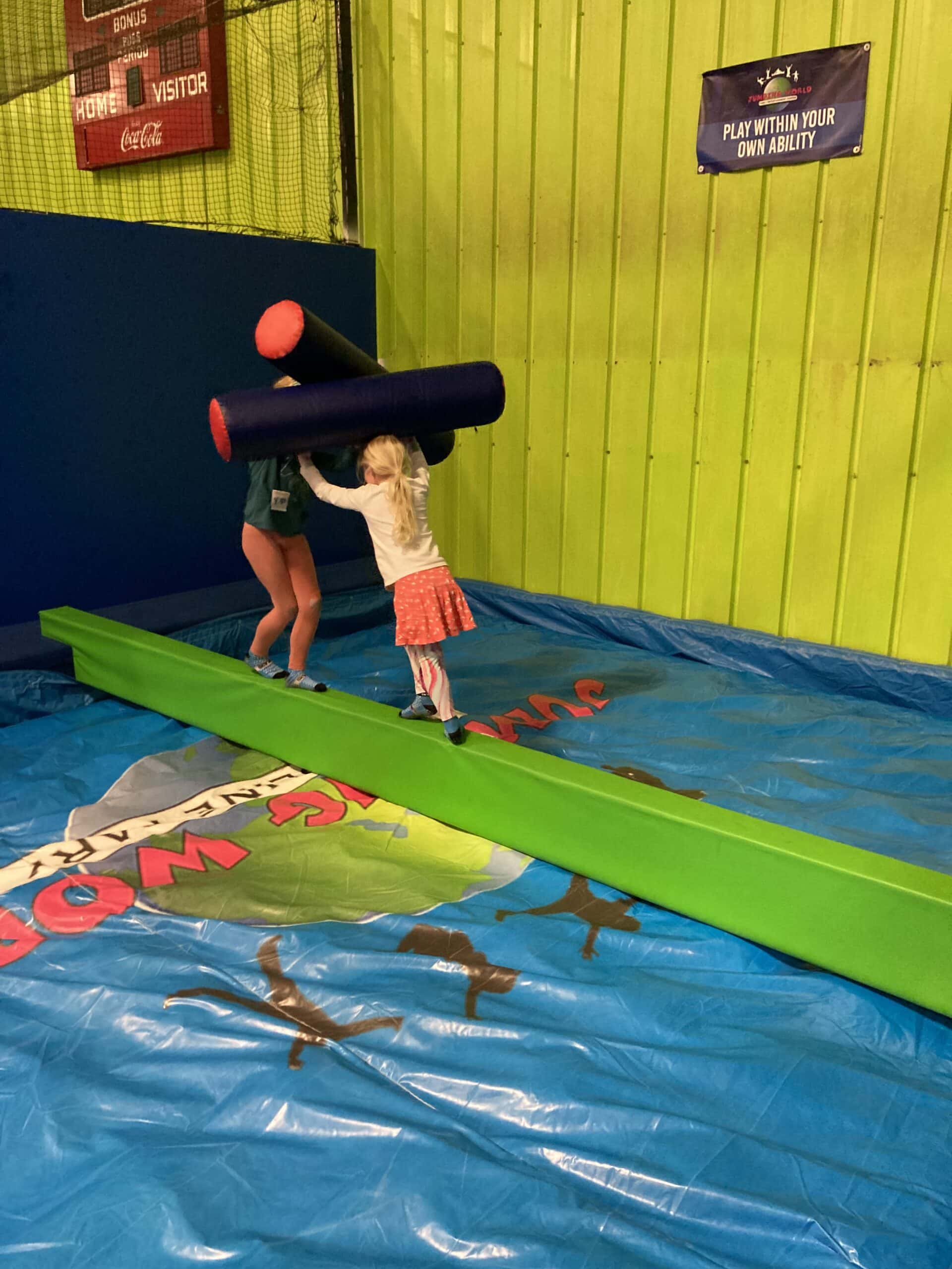 siblings jousting at Jumping World 