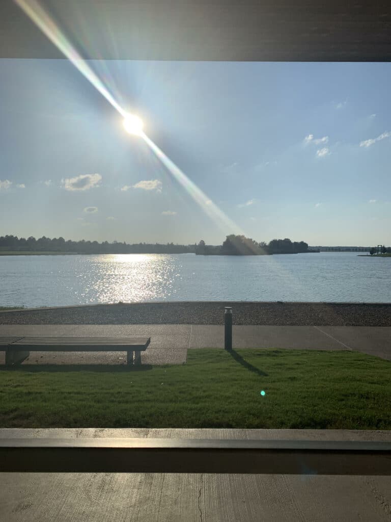 View from restaurant at Shelby Farms is a perfect place for a photo. The sun over the lake.