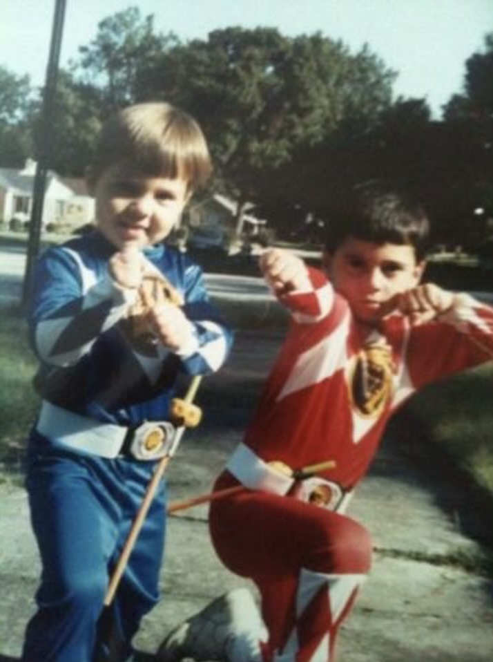2 boys in 90s costumes