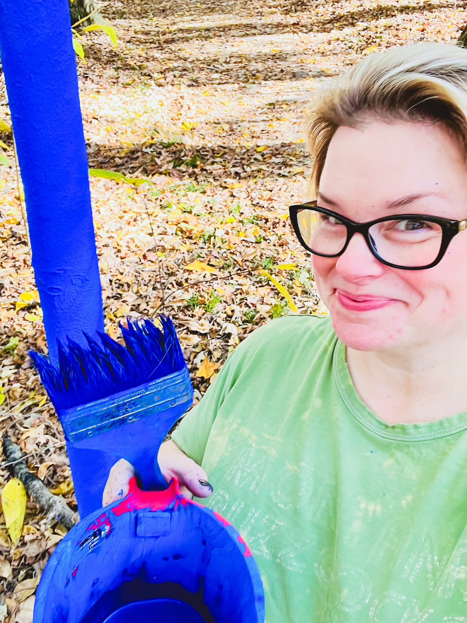 Cara putting the pigment on a tree for Shelby Canopy