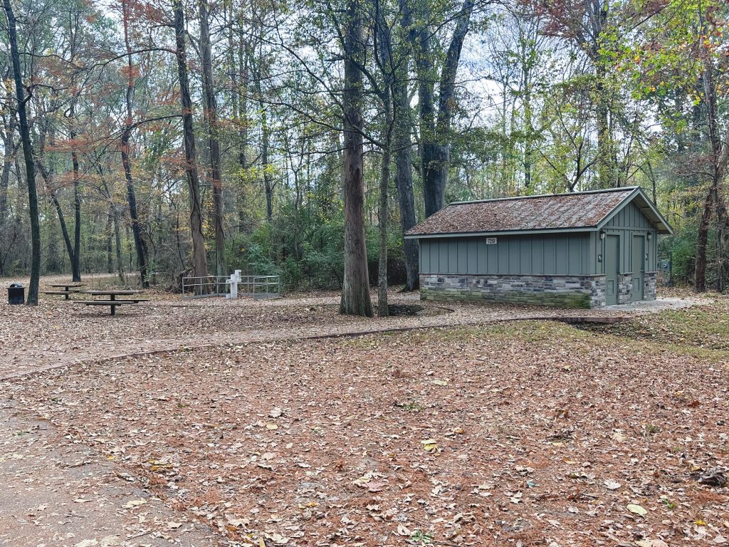 restrooms and picnic tables located right next to the parking area