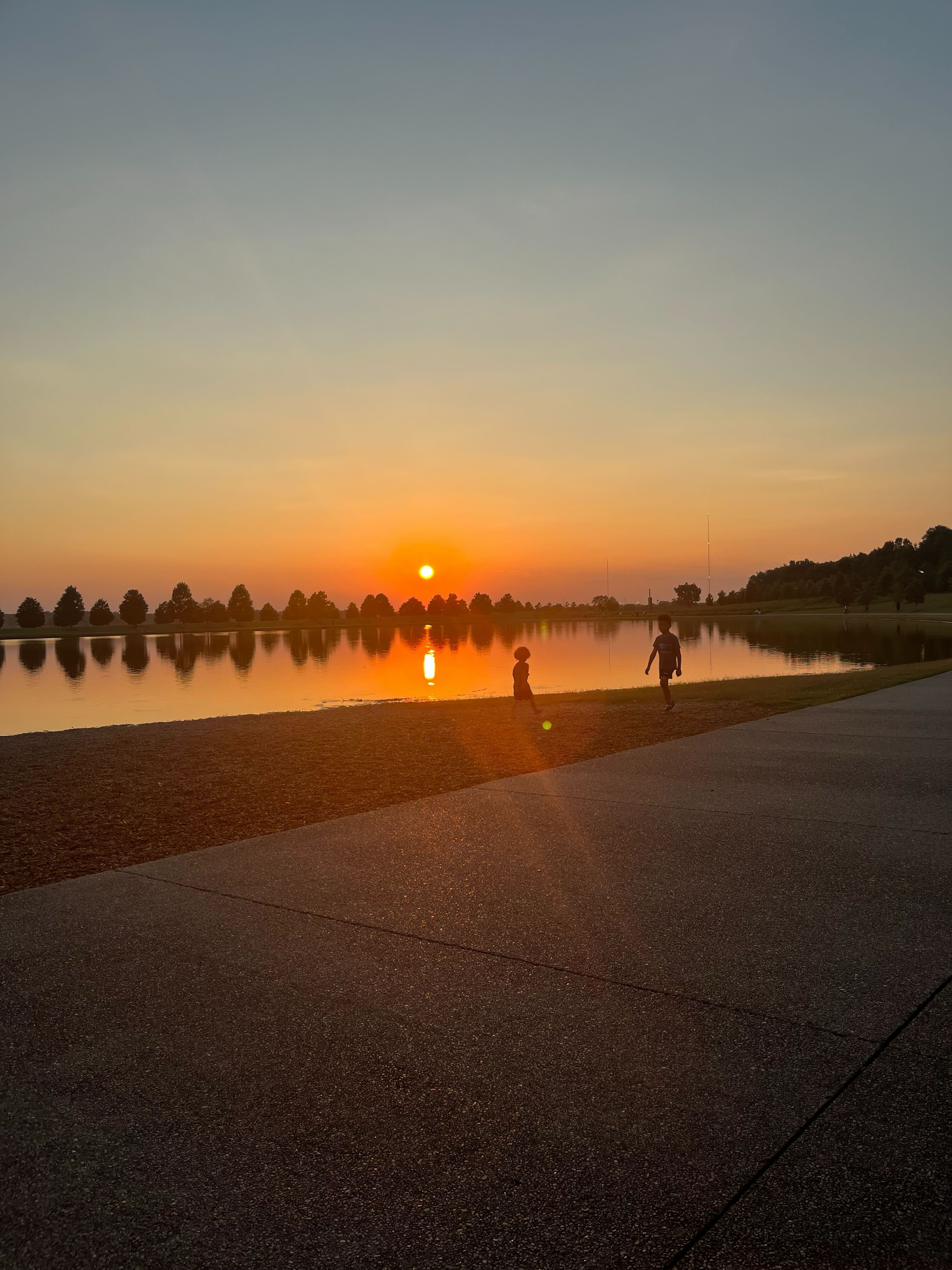 sunset over the lake at Shelby Farms