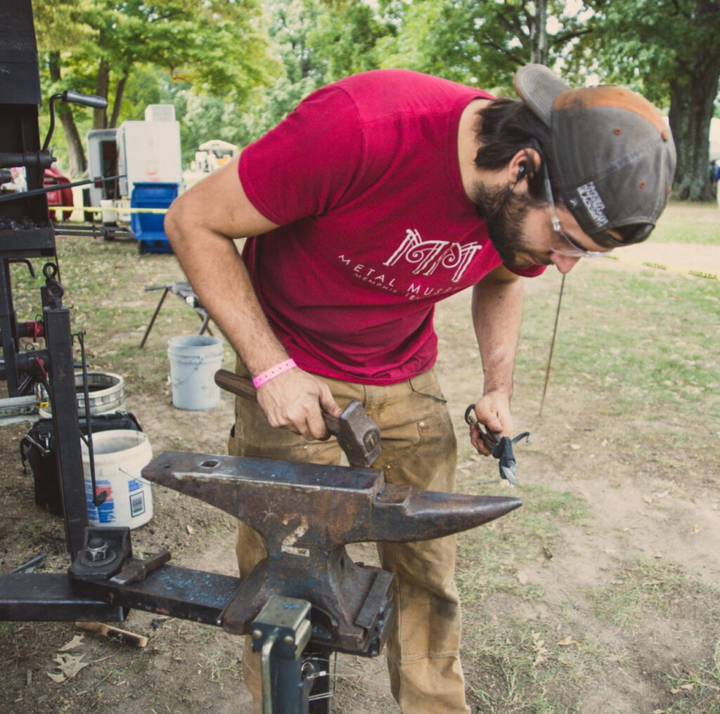 metal working demonstration at the Pink Palace Crafts Fair