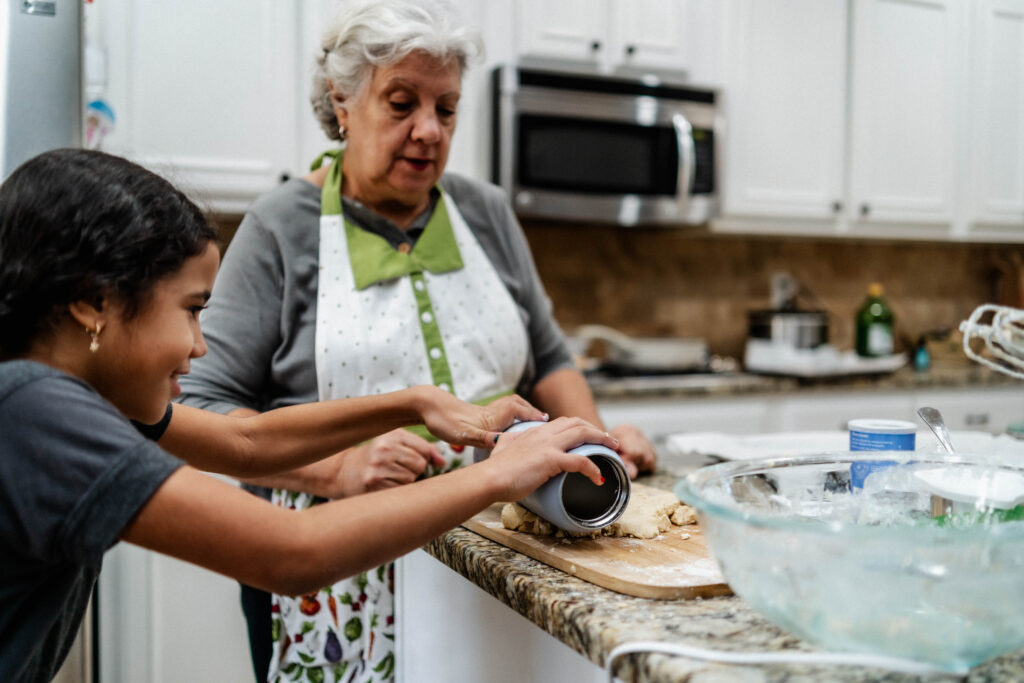 child baking with grandmother 